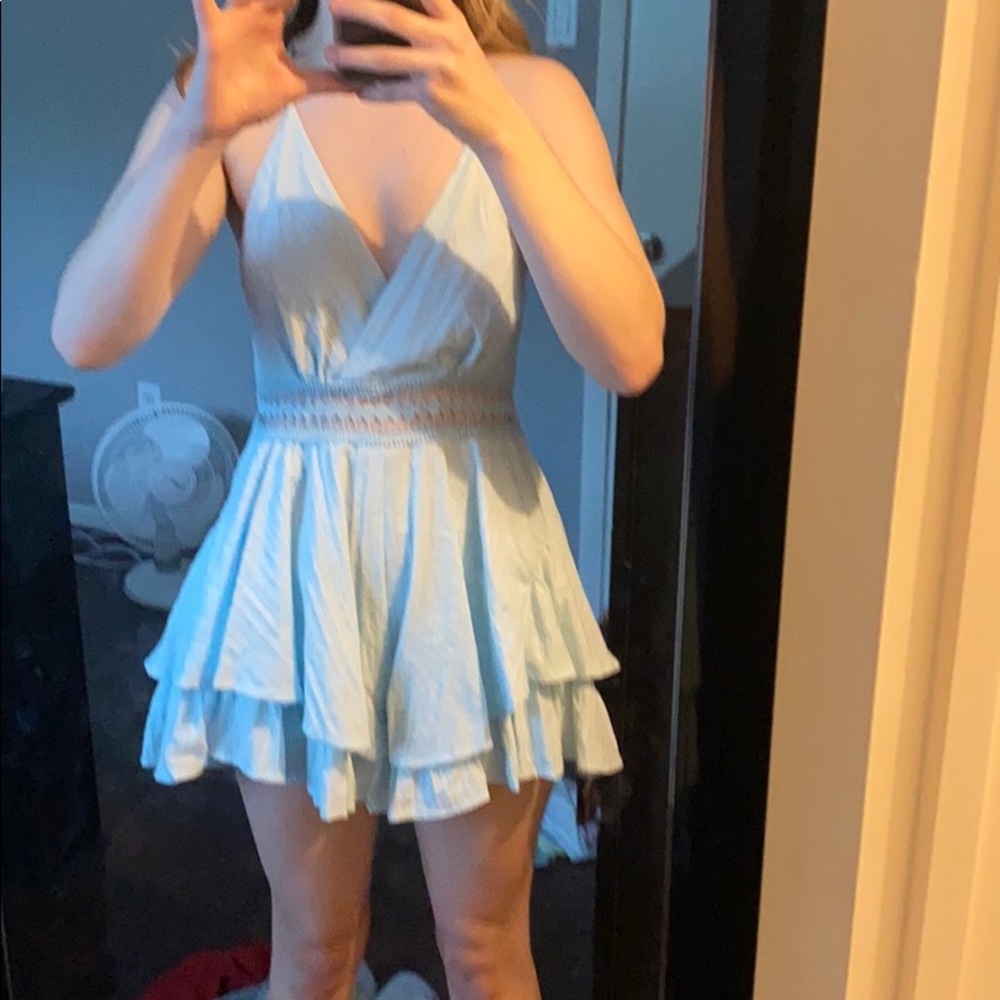 Light blue romper.